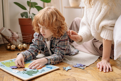 boy playing board game