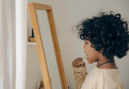 a child brushing teeth