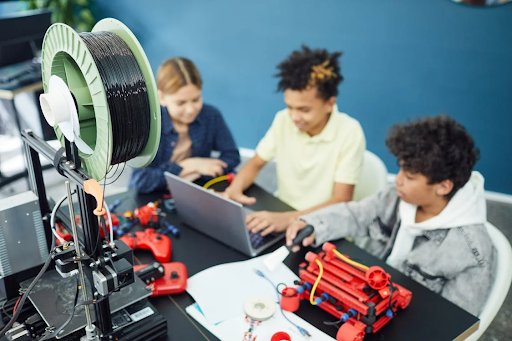 a group of kids coding