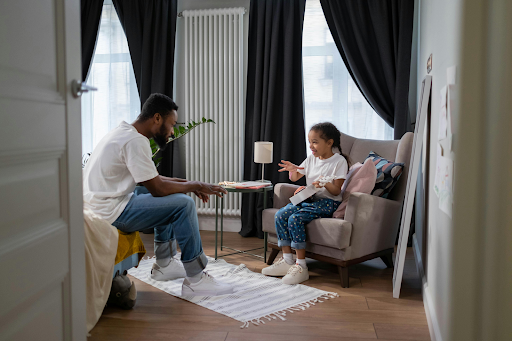 A guy teaching a girl