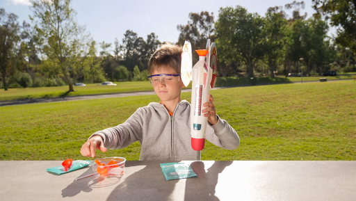 small kid playing with rocket