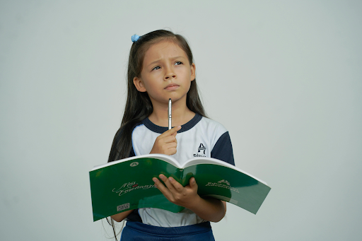 a girl holding notebook