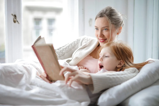 mom reading with a girl